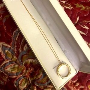 Gold pendant and chain.